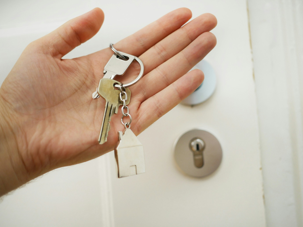 a person holding keys