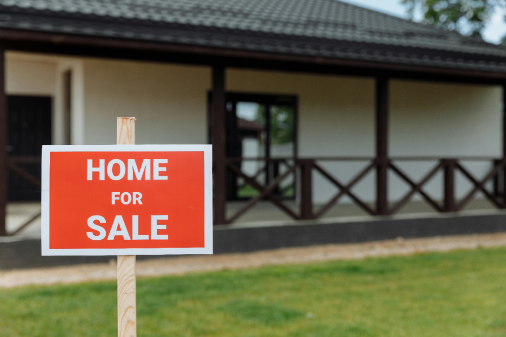 a home for sale sign