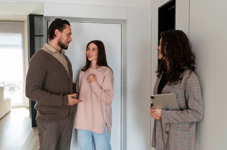 a real estate agent showing a house